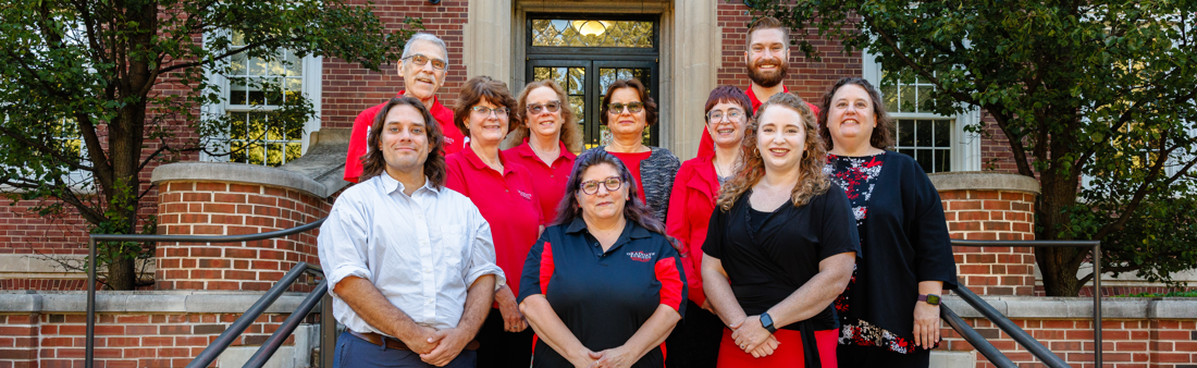Group photo of all Graduate School staff members on the steps of Hovey Hall.